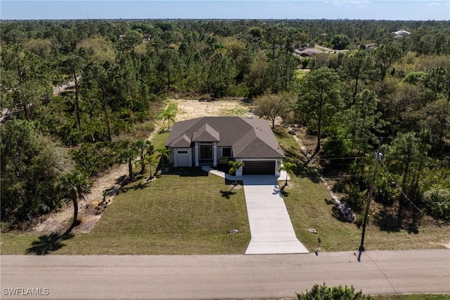 aerial view featuring a view of trees