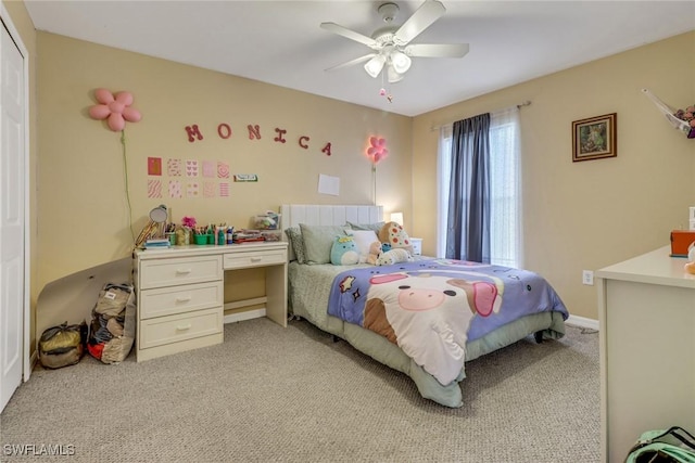 bedroom with light carpet and ceiling fan