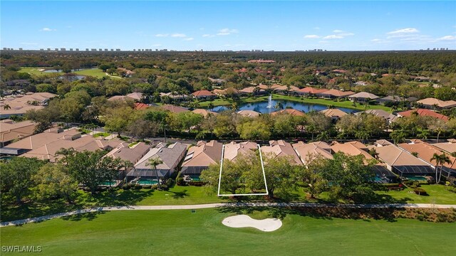 bird's eye view with a residential view and a water view