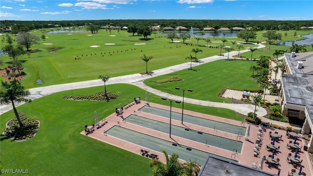 bird's eye view with golf course view and a water view