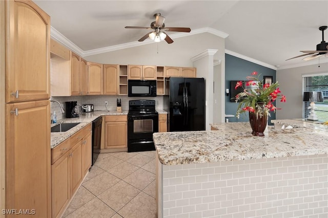 kitchen featuring light brown cabinets, a sink, black appliances, and ceiling fan