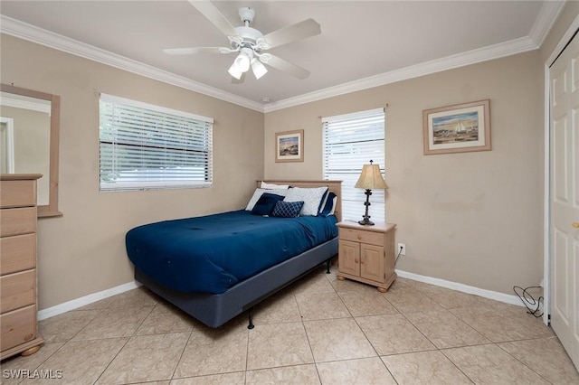 bedroom with ornamental molding, baseboards, and light tile patterned floors