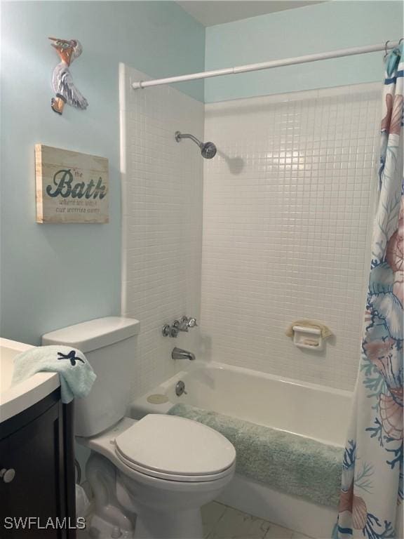 bathroom featuring toilet, shower / tub combo with curtain, and vanity