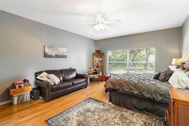 bedroom featuring ceiling fan and light wood-style flooring