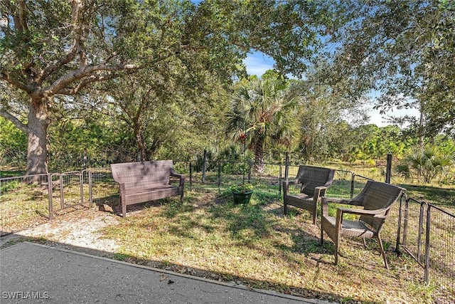 view of yard with fence