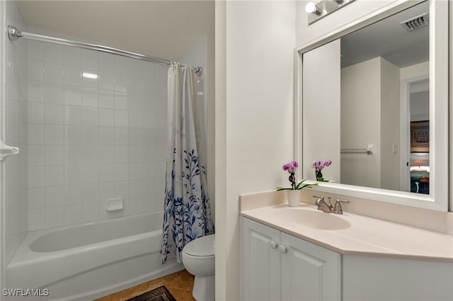 bathroom featuring tile patterned flooring, toilet, visible vents, vanity, and shower / tub combo with curtain