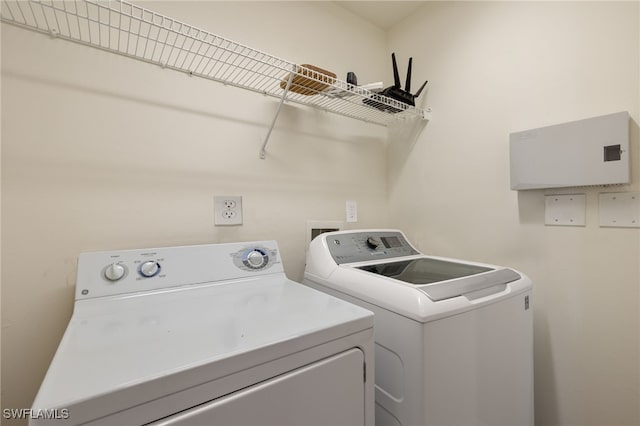 laundry area featuring laundry area and separate washer and dryer