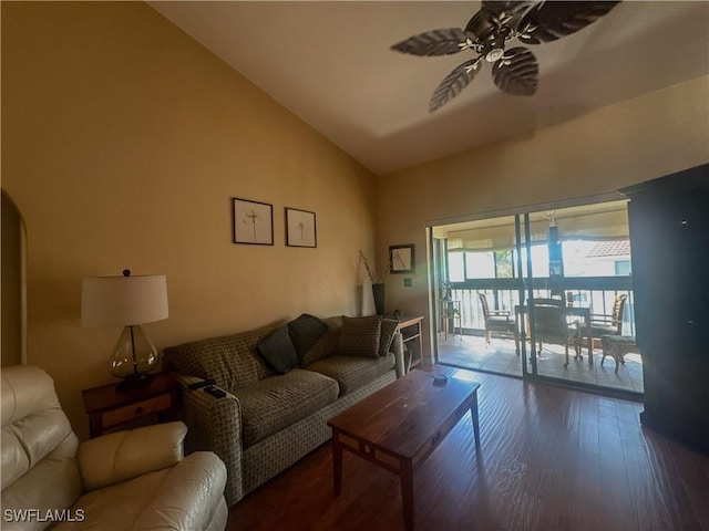 living room featuring ceiling fan, high vaulted ceiling, and wood finished floors