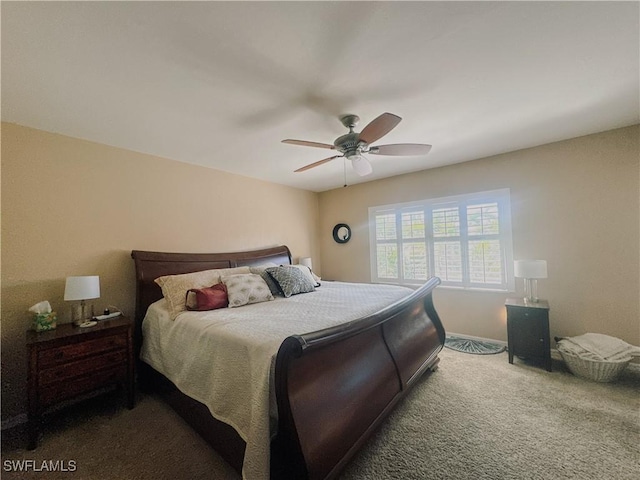 carpeted bedroom with a ceiling fan