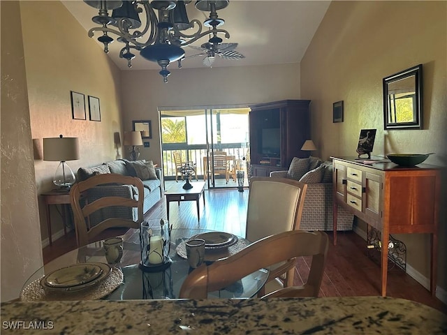 11570 Caravel Cir Unit 2022, Fort Myers, FL 33908 - dining room with a textured wall, wood finished floors, a ceiling fan, and baseboards