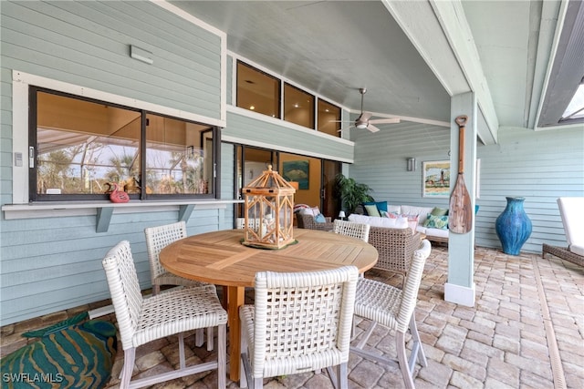 view of patio / terrace featuring ceiling fan and outdoor dining area