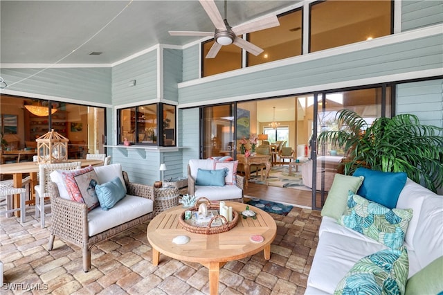 view of patio / terrace featuring visible vents, an outdoor living space, and a ceiling fan