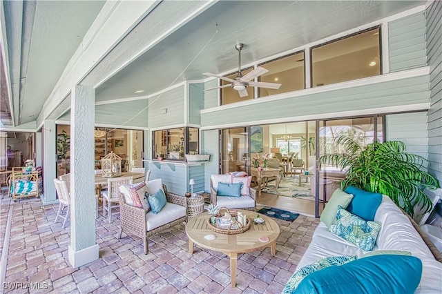 view of patio featuring ceiling fan, outdoor lounge area, and outdoor dining space