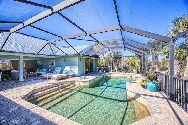 outdoor pool featuring an outdoor hangout area, a patio, and a lanai