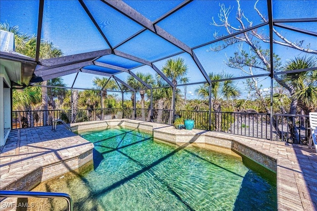 view of pool featuring a fenced in pool, a lanai, and a patio area