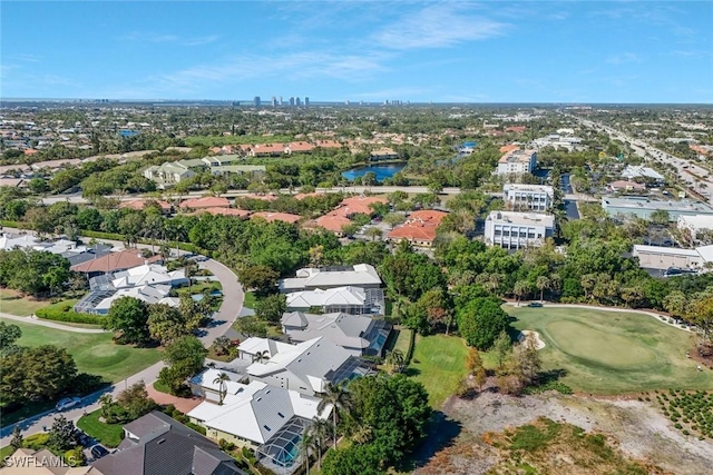 aerial view featuring view of golf course and a water view