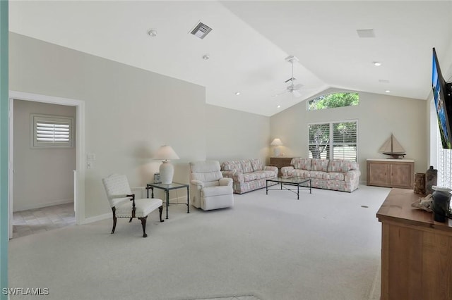 living room featuring a ceiling fan, visible vents, carpet floors, baseboards, and vaulted ceiling