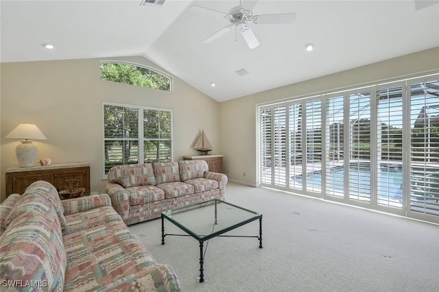 carpeted living area with recessed lighting, visible vents, ceiling fan, and vaulted ceiling