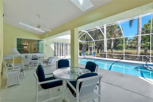 pool featuring glass enclosure, a patio, an outdoor living space, and ceiling fan