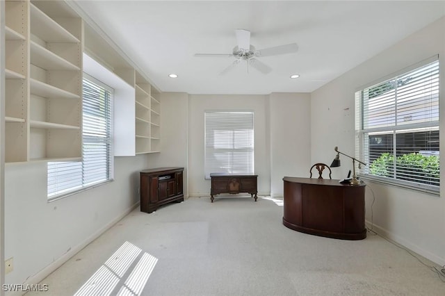 carpeted office space with recessed lighting, baseboards, and a ceiling fan