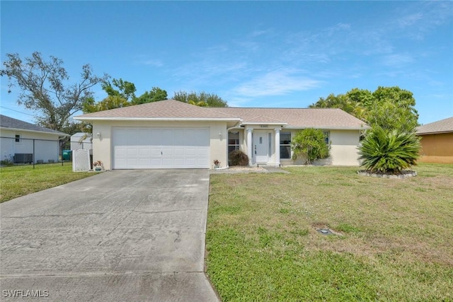 ranch-style home with an attached garage, stucco siding, concrete driveway, and a front yard