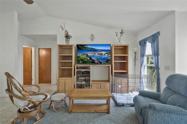 living area featuring vaulted ceiling