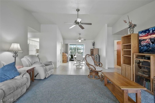 carpeted living room with lofted ceiling and tile patterned flooring