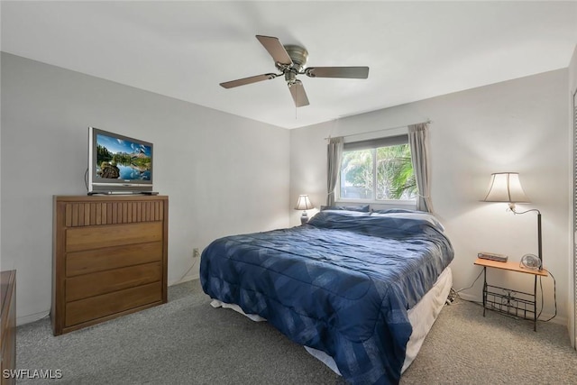 bedroom with ceiling fan and carpet floors