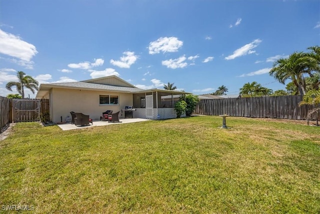 569 98th Ave N, Naples, FL 34108 - rear view of house with a patio area, stucco siding, and a sunroom