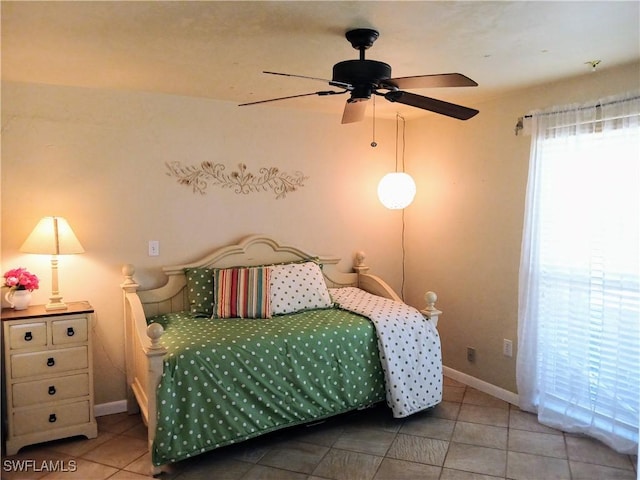 tiled bedroom with baseboards