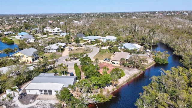 aerial view with a water view and a residential view