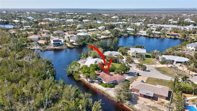 aerial view with a residential view and a water view