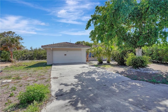 exterior space featuring concrete driveway