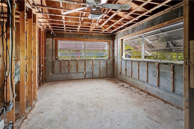 miscellaneous room featuring unfinished concrete flooring