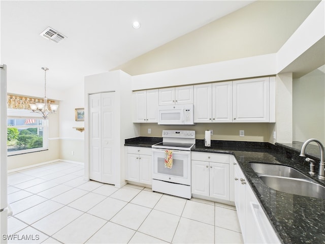 kitchen featuring light tile patterned floors, visible vents, white cabinets, a sink, and white appliances