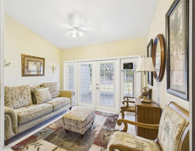 living room featuring french doors and a ceiling fan