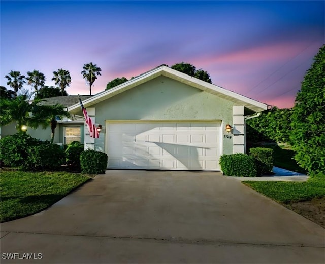 single story home featuring stucco siding