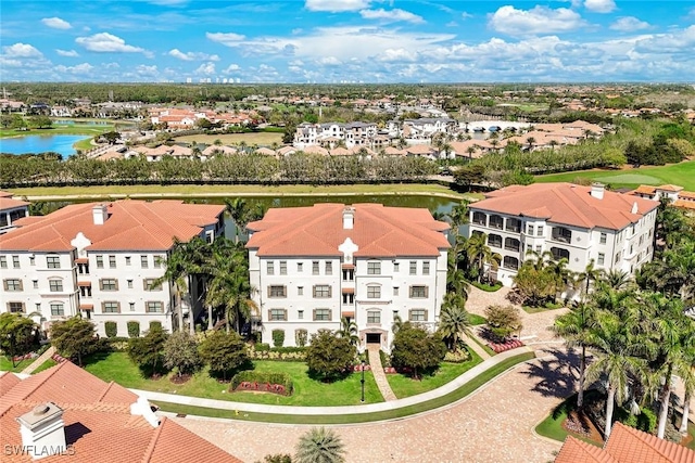 16445 Carrara Way Unit 201, Naples, FL 34110 - aerial perspective of suburban area featuring a nearby body of water and apartment complex / building