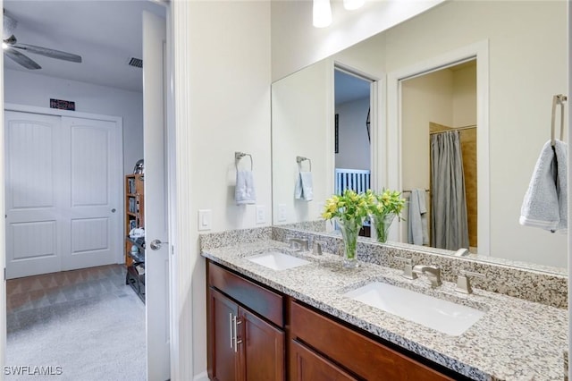 9151 Snowy Owl Way, Naples, FL 34120 - full bathroom featuring double vanity, ceiling fan, and a sink