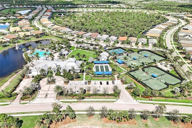 birds eye view of property featuring a residential view and a water view