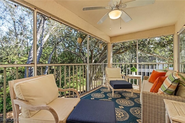 sunroom / solarium with ceiling fan