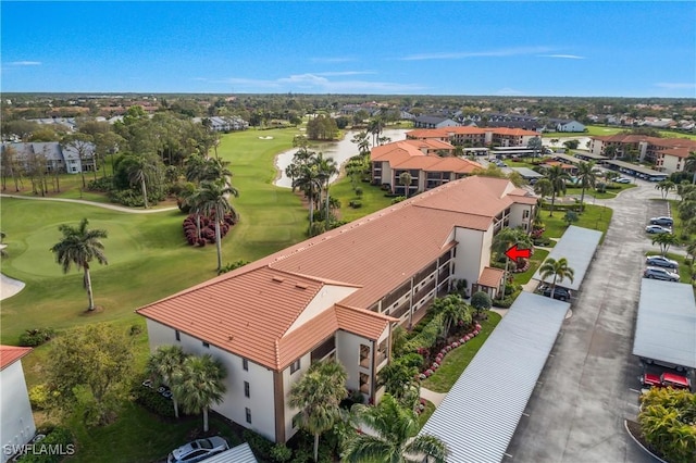 aerial view featuring a residential view and view of golf course