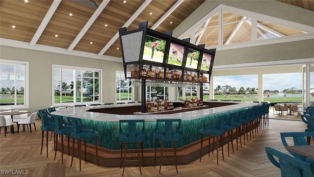 interior space featuring high vaulted ceiling, wooden ceiling, beamed ceiling, and a community bar