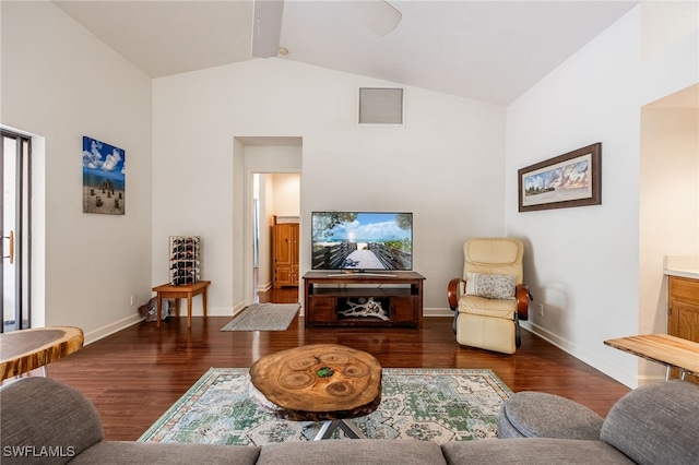 living room with visible vents, vaulted ceiling, baseboards, and wood finished floors