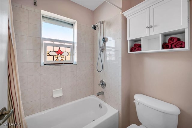 bathroom with shower / bath combination with curtain and toilet