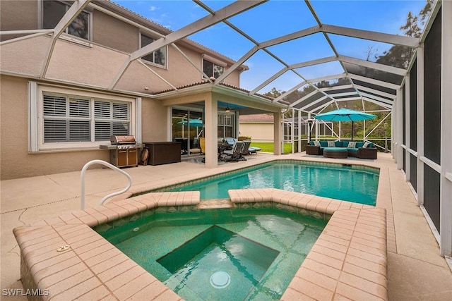 view of swimming pool with a pool with connected hot tub, outdoor lounge area, area for grilling, and a patio