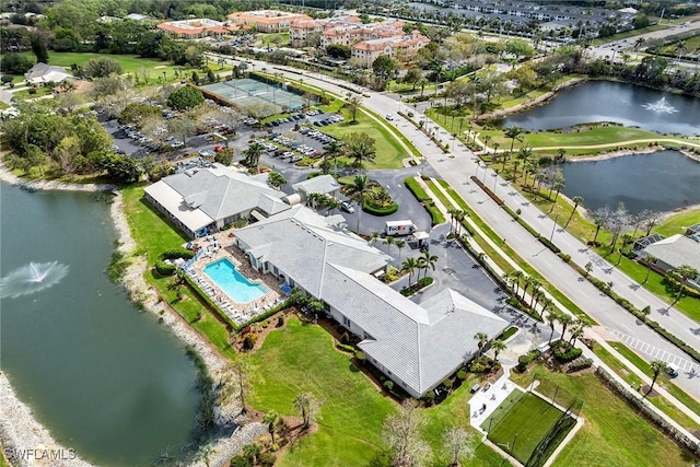 drone / aerial view featuring a water view