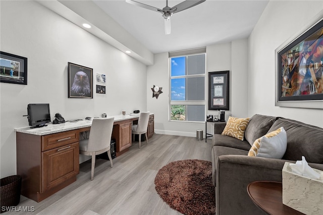 office area featuring light wood finished floors, recessed lighting, a ceiling fan, and baseboards