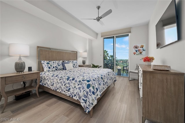 bedroom featuring access to exterior, ceiling fan, and light wood-style flooring