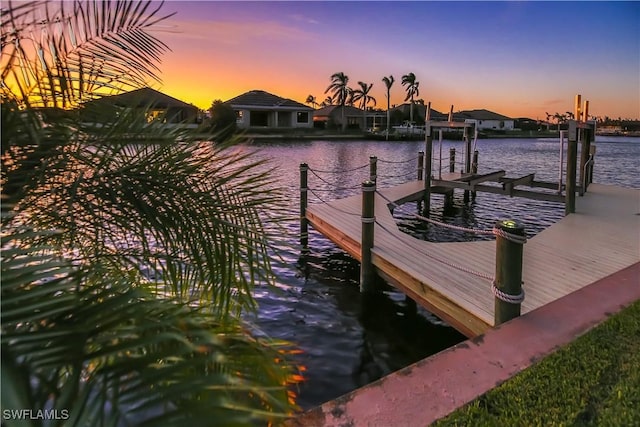 view of dock with a water view and boat lift